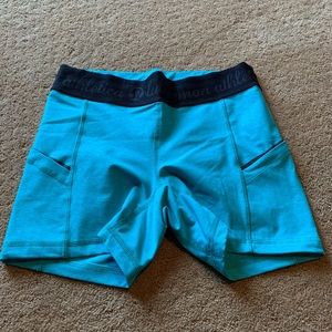 Turquoise Lululemon bike shorts